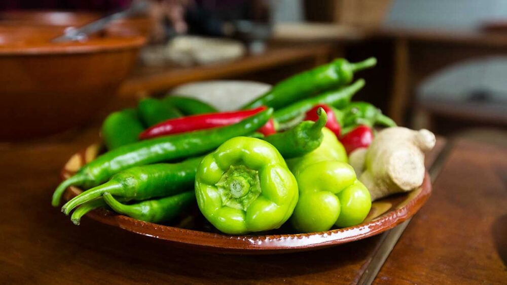 Vegetables In Bowl Peppers in a wooden bowl